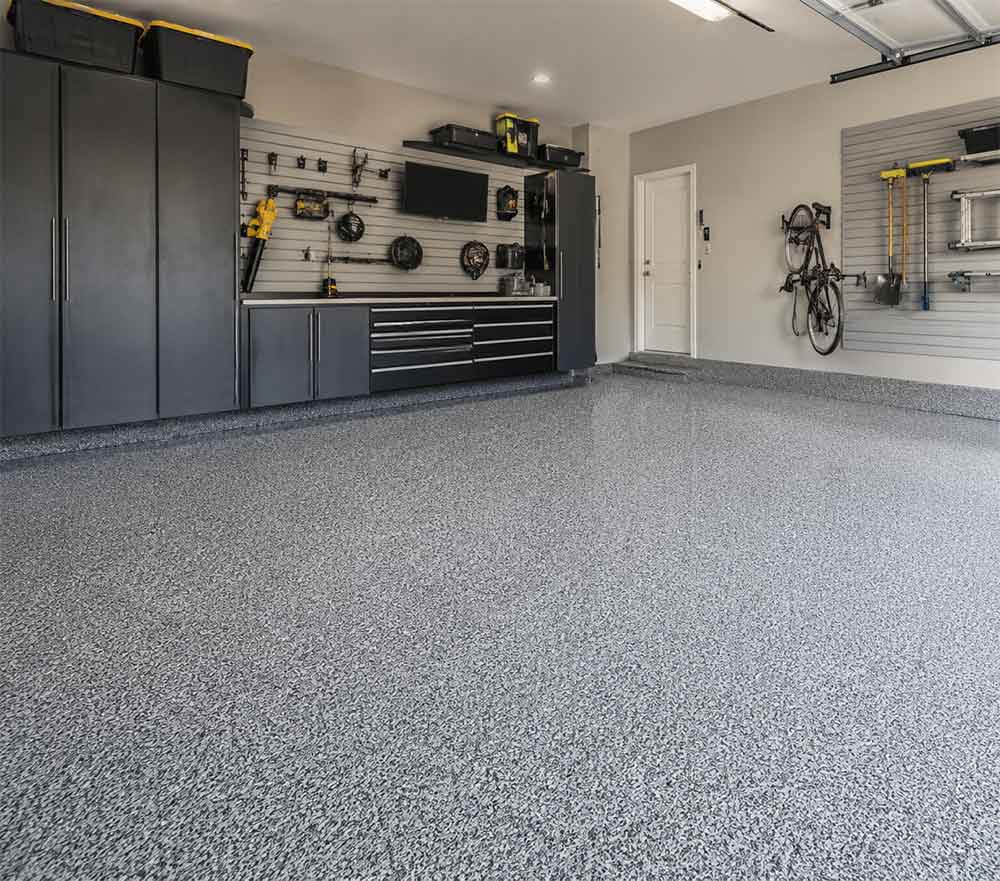 Garage-Flooring-image Premium garage flooring installation with decorative flake finish