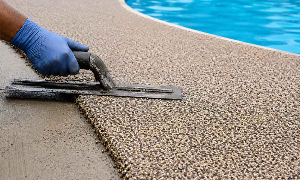 Professional-rubber-surfacing-installation-process-on-a-residential-property-in-Dunnellon Professional rubber surfacing installation process on a residential property in Dunnellon