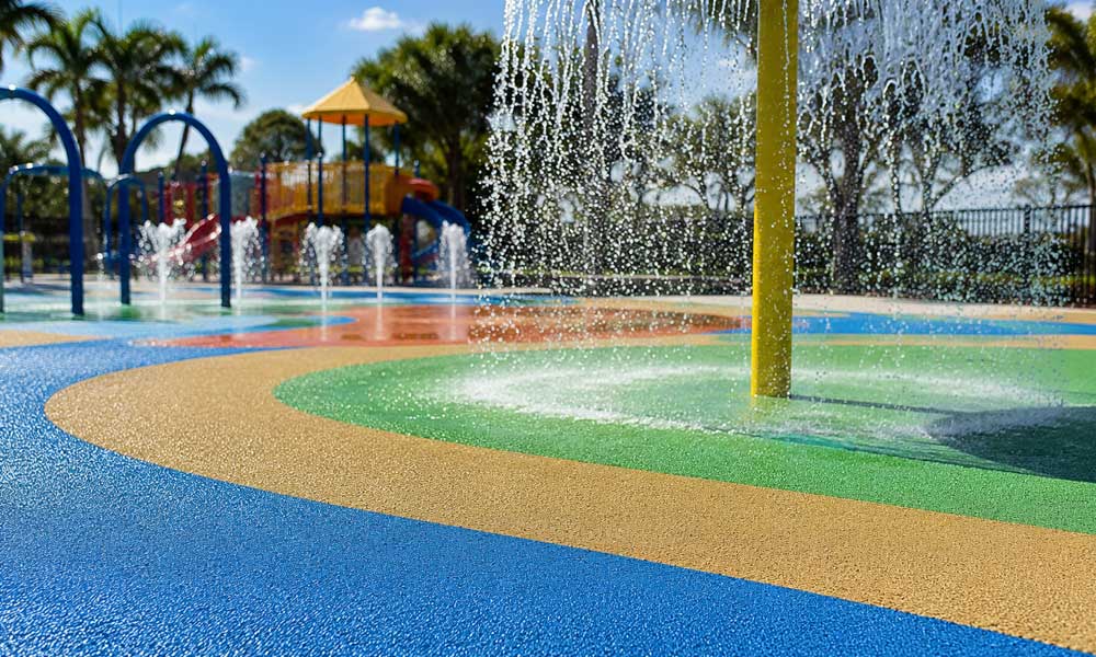 Rubber-Surfacing-Lakeland-FL-colorful-splash-park-with-safe-playground-flooring Rubber Surfacing Lakeland FL colorful splash park with safe playground flooring