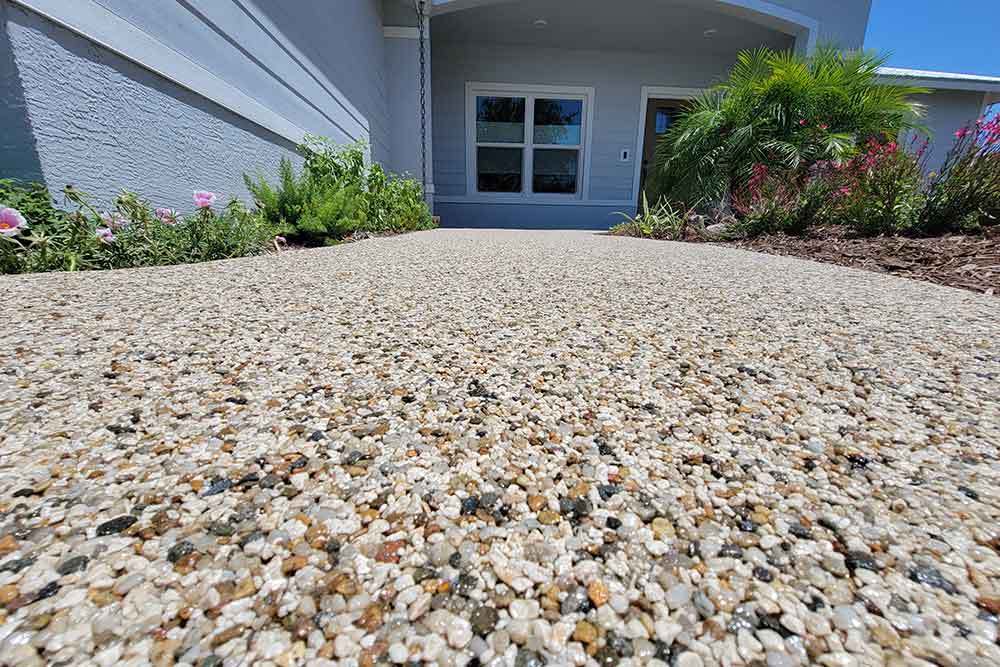 walkway Elegant Vuba Stone walkway installation featuring seamless resin bound stone landscaping pathway
